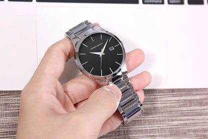 Montre pour homme Hannah Martin, boîtier en acier inoxydable, mouvement à quartz, cadran de 41 mm, style professionnel, avec affichage du calendrier (imitation)