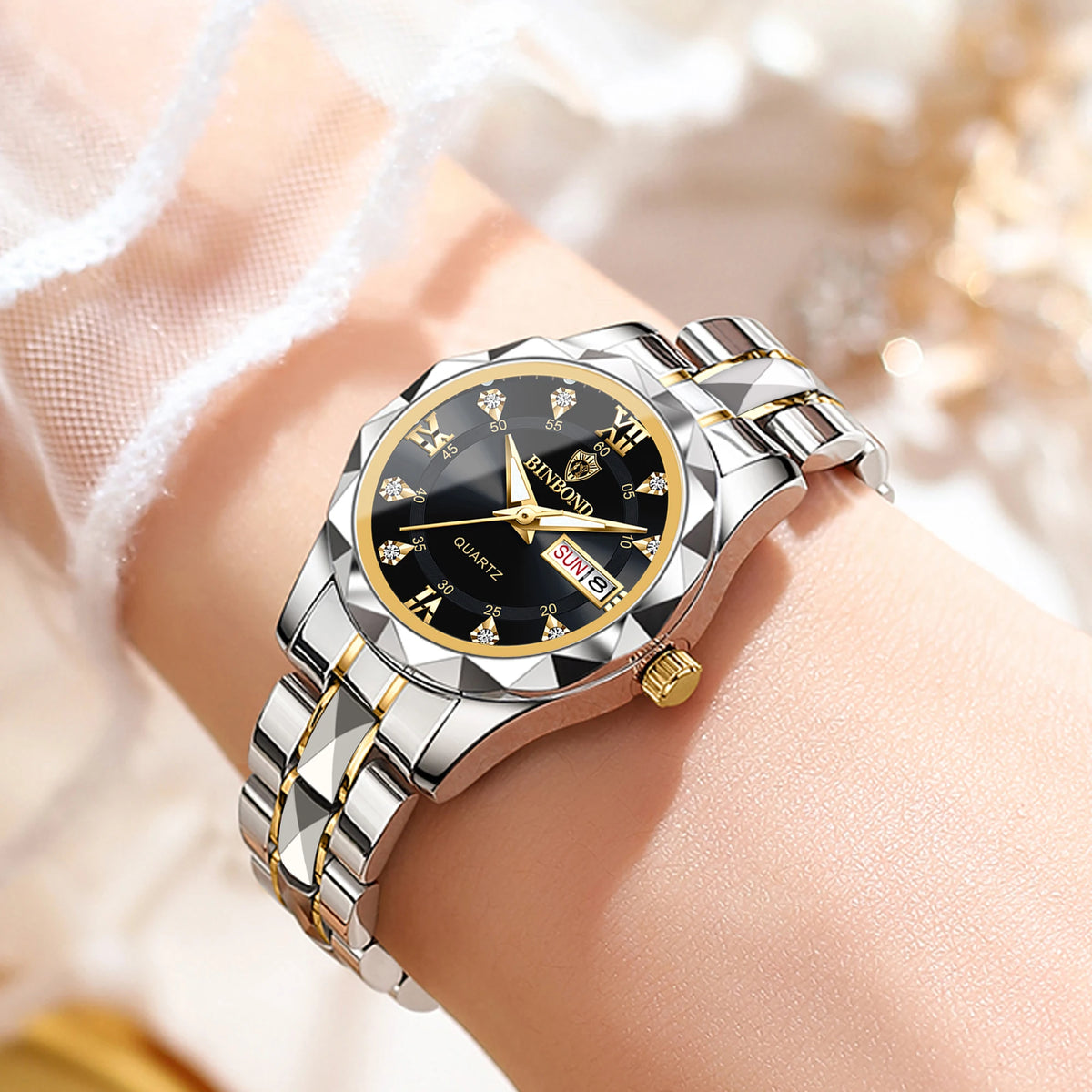 Montre pour femme BINBOND : montre à quartz robuste, luxueuse, luminescente et étanche, dotée d'un affichage précis de la date et du jour de la semaine.