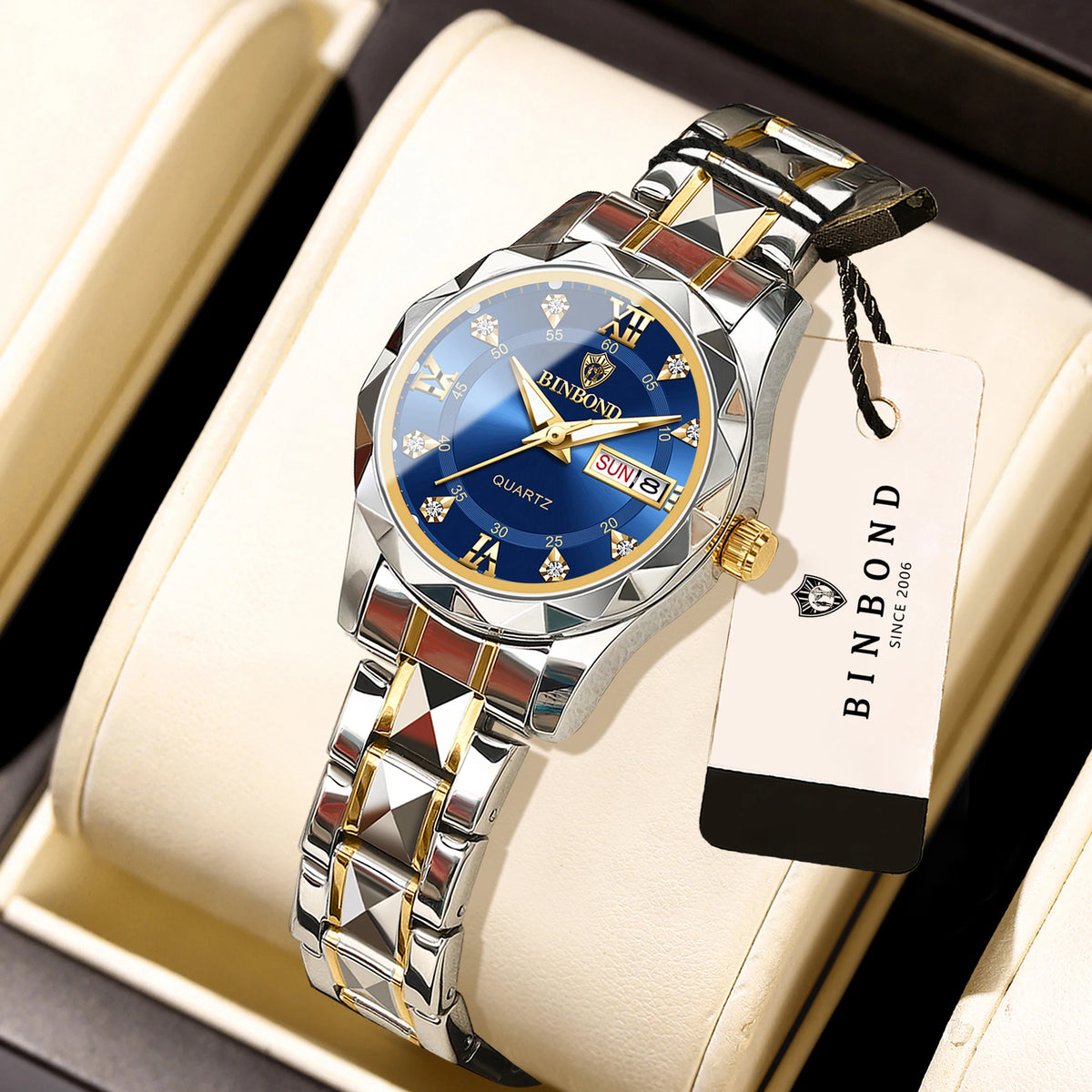 Montre pour femme BINBOND : montre à quartz robuste, luxueuse, luminescente et étanche, dotée d'un affichage précis de la date et du jour de la semaine.