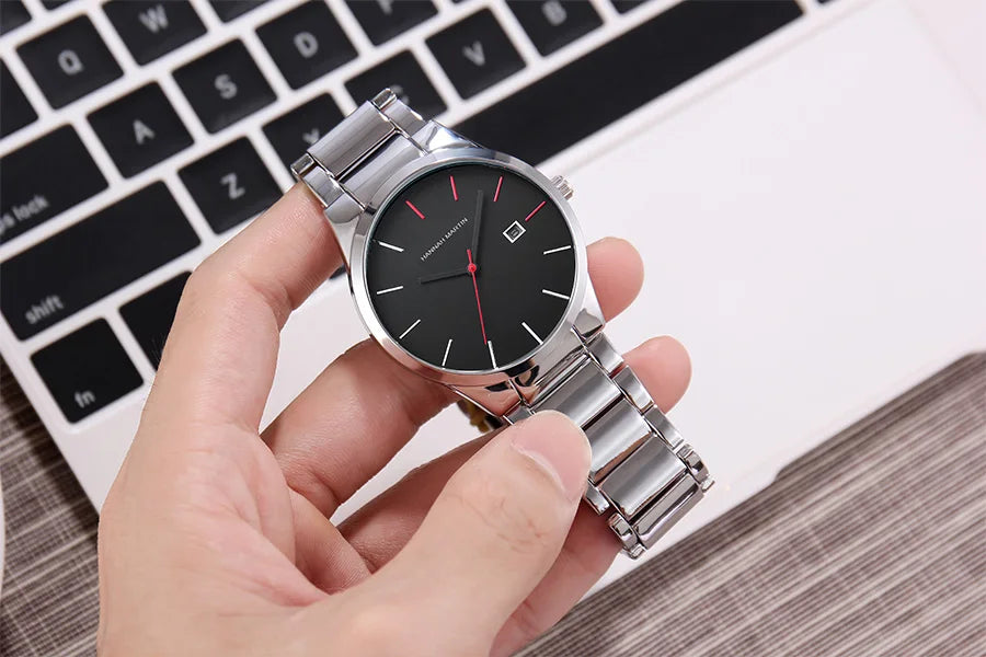 Montre pour homme Hannah Martin, boîtier en acier inoxydable, mouvement à quartz, cadran de 41 mm, style professionnel, avec affichage du calendrier (imitation)
