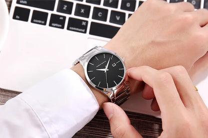 Montre pour homme Hannah Martin, boîtier en acier inoxydable, mouvement à quartz, cadran de 41 mm, style professionnel, avec affichage du calendrier (imitation)