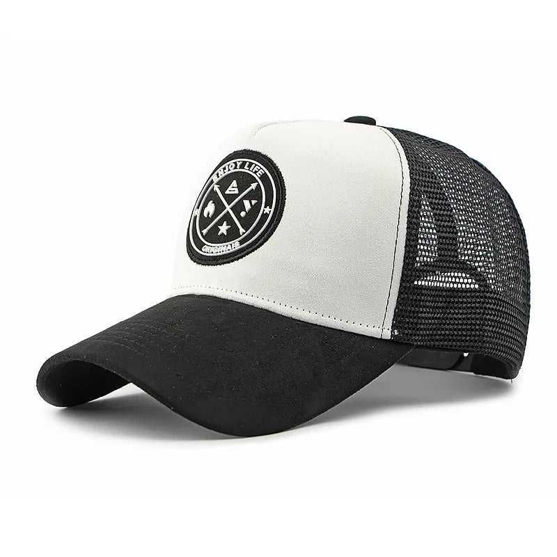 A retro-style suede work cap with a leather logo and breathable mesh design, suitable for both men and women to wear casually.